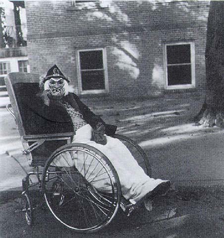 Masked Woman in Wheelchair, 1970